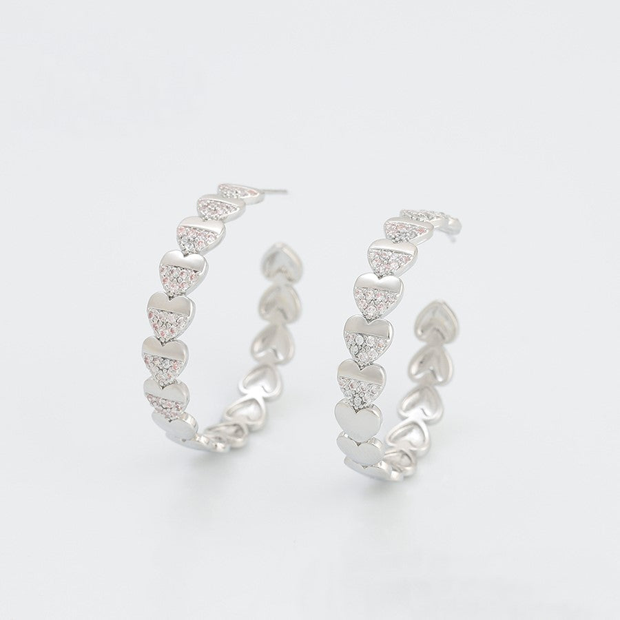Boucles d'oreilles créoles coeurs rhodiés