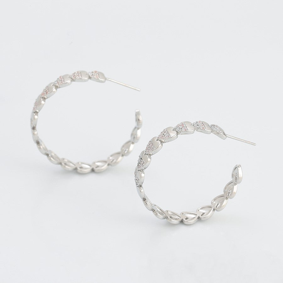 Boucles d'oreilles créoles coeurs rhodiés