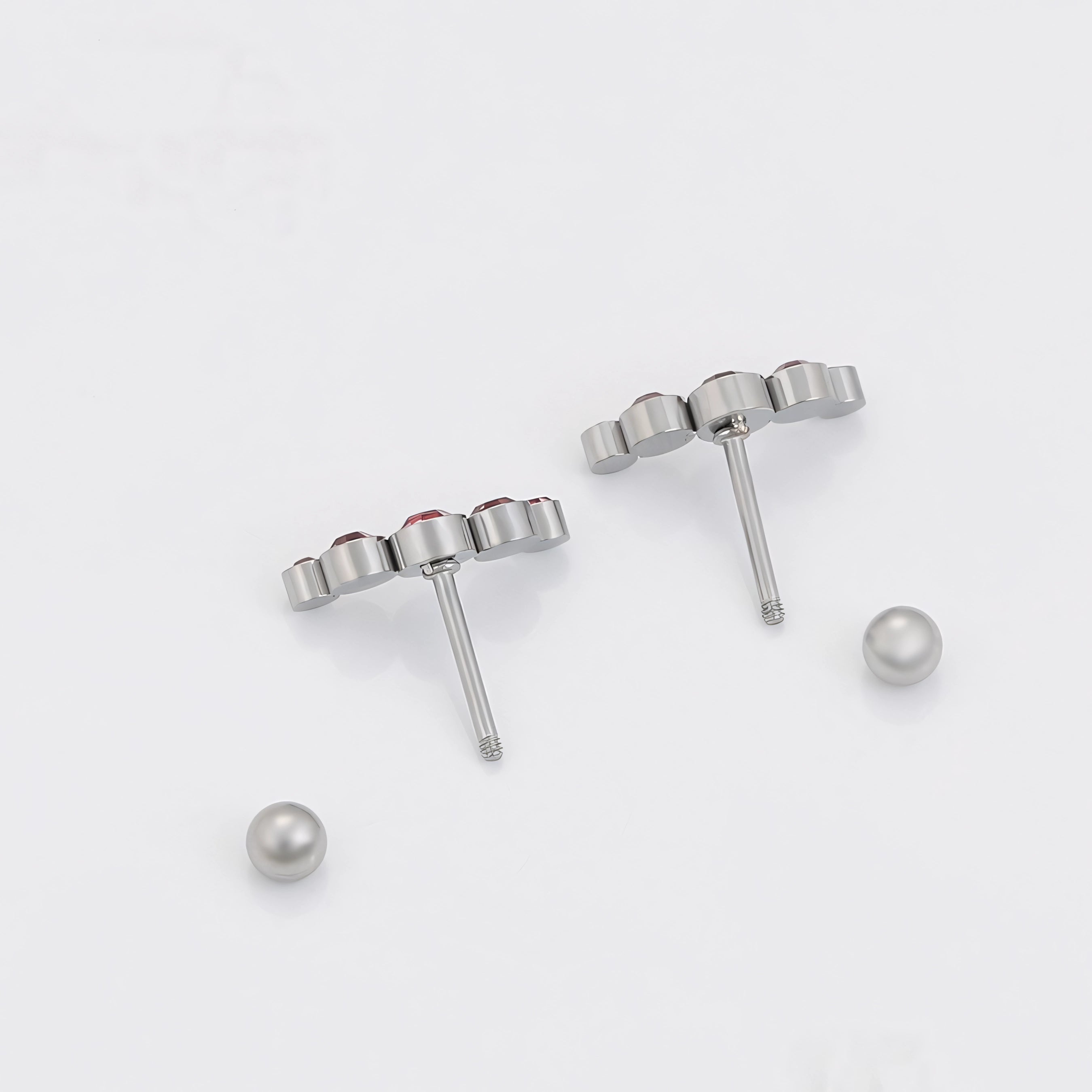 Broquel con Mini Zirconias Rosas Acero Inoxidable