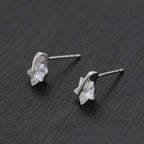 Broquel Estrella de Zirconia Blanca