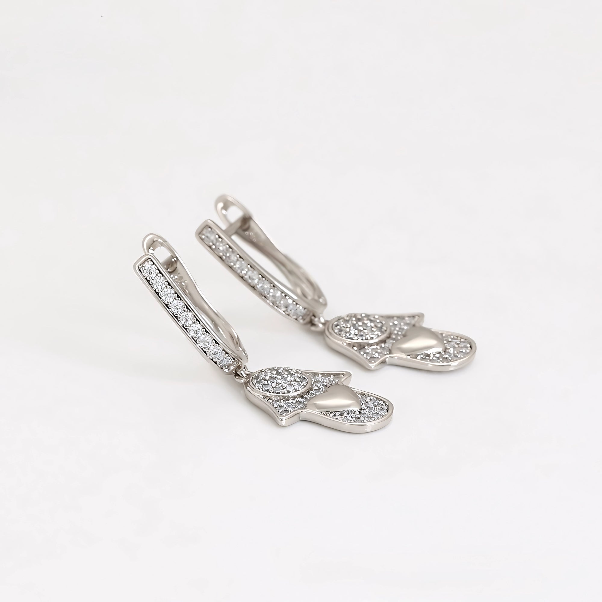 Aretes Mano de Fátima Chapado en Platino con Zirconias