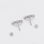 Broquel con Mini Zirconias Rosas Acero Inoxidable