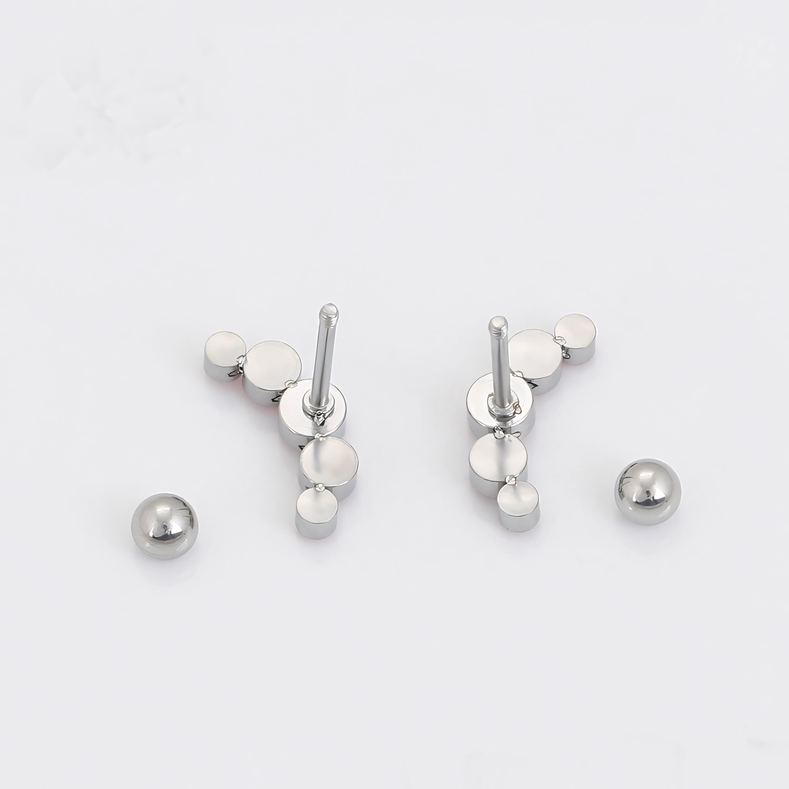 Broquel con Mini Zirconias Rosas Acero Inoxidable