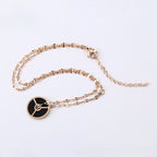 Collar Acero Oro Rosa Con Detalles Negros Elegante