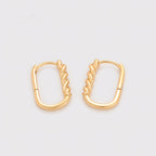 Huggie Semi Ovalada Trenzada Oro Laminado 18K