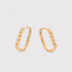 Huggie Semi Ovalada Trenzada Oro Laminado 18K