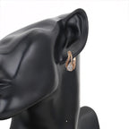 Set de Aretes y Anillo en Oro Laminado Rosa Elegante y Moderno