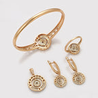 Set de Lujo Aretes Anillo Brazalete y Dije en Oro Laminado 18K
